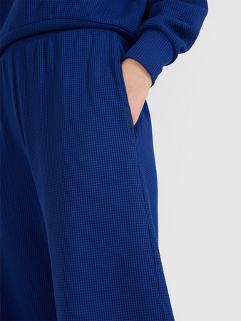 Spodnie oversize z szerokimi nogawkami damskie 4F 4FRSS25TTROF1397-31S