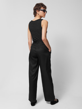 Spodnie tkaninowe z lyocellu damskie Outhorn OTHWSS24TTROF725-20S