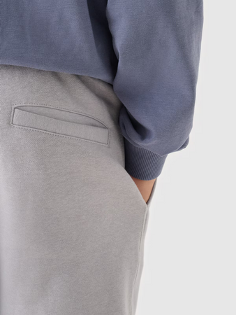 Spodnie dresowe joggery chłopięce 4F Junior 4FJRAW24TTROM1175-25S